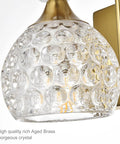 Close-up of crystal orb shade in Two Light Brushed Gold Vanity Light Fixtures For Bathroom Over Mirror With Crystal Orb Shades