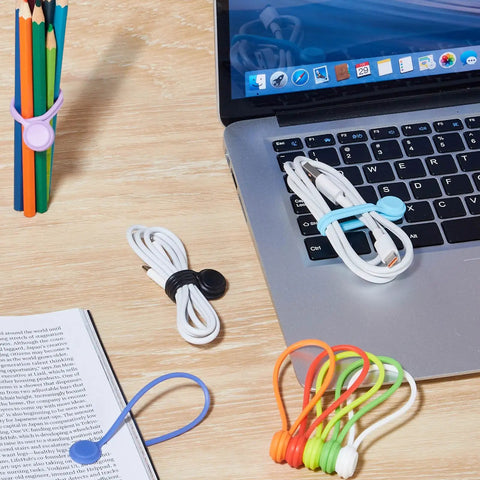 Magnetic Cable Ties 10 Pack Reusable Cable Organizers for earbuds and cords shown securing cables on desk near laptop.
