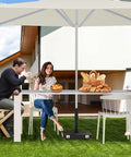 Outdoor scene with umbrella supported by 45lbs Beefy Heavy Duty Outdoor Umbrella Base For 1.2 To 2.2 Inch Poles