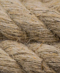 All Natural Jute Rope 1 Inch By 48 Feet 4 Strand Twisted Hemp Rope For Crafts Macrame DIY Home Decor Cat Scratching Post Hammock And Nautical Projects Brown close-up of twisted strands.