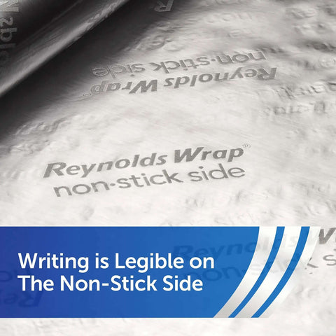 Close-up of Nonstick Aluminum Foil Roll For Easy Cooking And Mess Free Cleanup showing legible writing on the non-stick side.