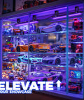 Display case with model cars illuminated by Lit Blacklight Strip Lights USB 1ft Bar, 10W, showcasing UV glow effects.