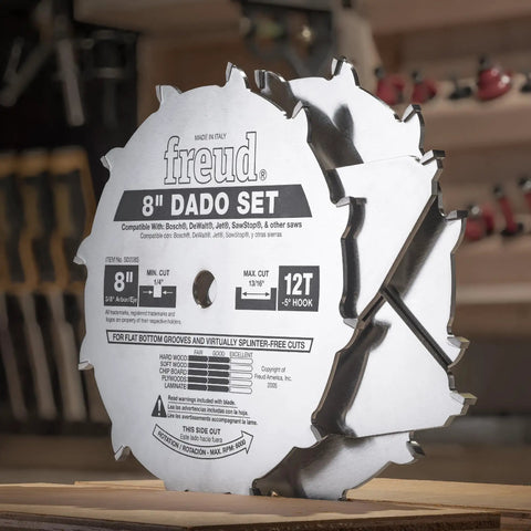 Close-up of an 8-inch dado set with visible teeth, showing brand label and specifications in a woodworking workshop.