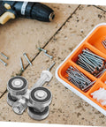 Stainless Steel Double Bearing Sliding Door Caster Wheel Kit For Ultra Smooth Rolling, shown with screws and a drill