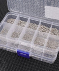 1200 Piece Miniature Self Tapping Screw Set Featuring Crosshead Drive And Rugged Carbon Steel Build For Diy Repairs And Furniture Assembly, organized screws in a clear storage box.