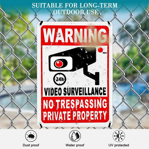 Private Property No Trespassing Sign Bundle Of Rustproof Aluminum With Reflective Film For Night Visibility 24 Hour Video Surveillance Signs Ten By Seven Inch Security Signs For Homes And Businesses 4 Pack displayed on a fence