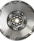 Heavy Duty Dual Mass Clutch Flywheel for 2003 to 2007 Infiniti G35 and 350Z, featuring precision stamped steel face and solid design.