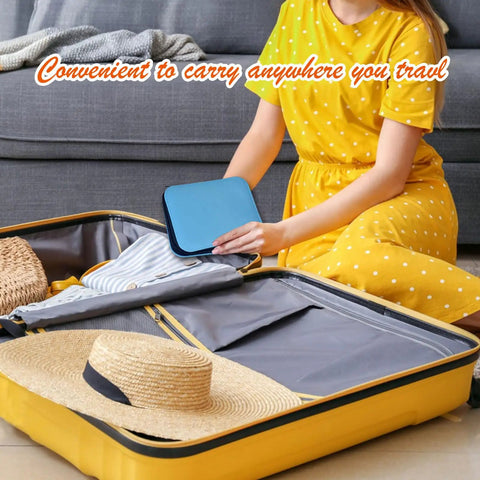 Person placing Portable Sewing Kit With Case For Home Travel And Emergency Repairs 18 Spools Thread Scissors Needles in suitcase