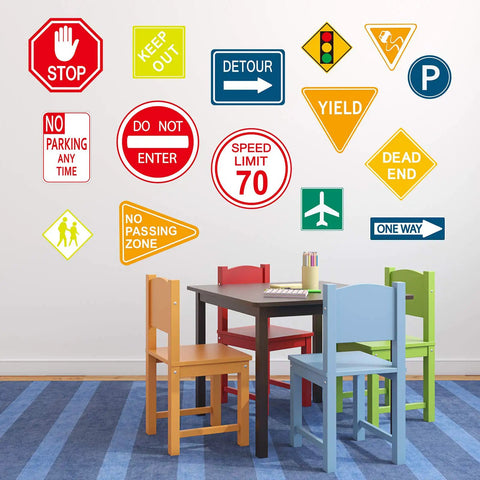 15 Piece Road Sign Wall Decals Set Traffic Street Sign Stickers Vinyl Wall Decor with chairs and table in playroom.