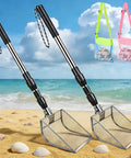 Beach Day Must Have Sand Sifter Set with telescoping handle, angled scoop, and stainless steel head on beach with bags.