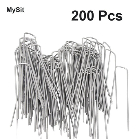 Pile of heavy duty 6 inch 11 gauge galvanized garden stakes, 200 pack, used for anchoring weed barrier fabric and landscaping