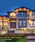 Smart Motion Sensor Outdoor Wall Light Dusk To Dawn LED Waterproof Exterior Fixture on house facade at night