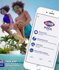 Children jumping into a swimming pool beside a phone with the Clorox Pool app, ensuring clean water maintenance.