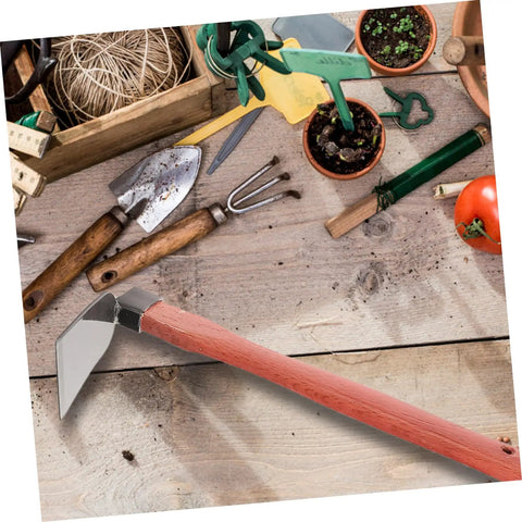 Heavy Duty Stainless Steel Garden Hoe With Ergonomic Wooden Handle Lightweight Planting Tool For Loosening Soil Weeding And Lawn Maintenance on a wooden table with gardening tools.