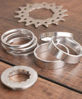 Single Speed Fixie Conversion Kit for mountain and road bikes with Shimano and SRAM cassette hubs, including spacers and 16T gear cog.