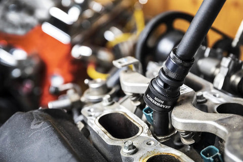 1/2 Inch 6 Point Metric Universal Impact Socket Set, 15 Piece, attached to engine, built tough in Cr-Mo steel for mechanics