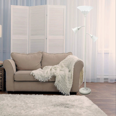 Chic living room with ivory Three Light Floor Lamp With Scalloped Champagne Glass Shades In Restoration Bronze Finish For Living Room Or Reading Nook