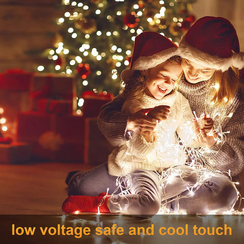 Children enjoying Ultra Long Outdoor Christmas Lights 330Ft 1000 LED String Lights With Reel 8 Modes And Timer Remote UL Listed
