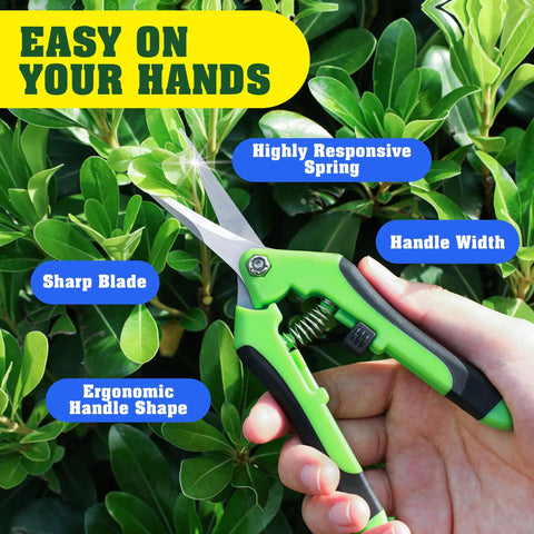 Close-up of green shears from Four Pack Garden Pruning Shears Set With Stainless Steel Blades, used for trimming plants.