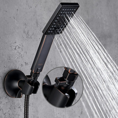 Close-up of Go-To Shower Flow Control Valve with brass body and lever handle, oil-rubbed bronze finish, attached to a wall
