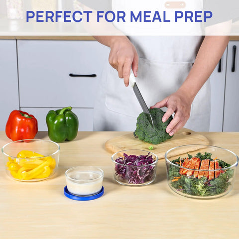 Glass Bowls Set Of Four With Lids, 1, 2, 4 And 7 Cup Sizes, Food Storage And Meal Prep Containers on kitchen counter with fresh vegetables