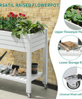 Elevated Garden Bed Kit With Legs And Wheels Large Resin Planter Box Stand With Drain Plug And Storage Shelf Perfect For Plants Vegetables Fruits Outdoor Durable Grayish White in a garden setting