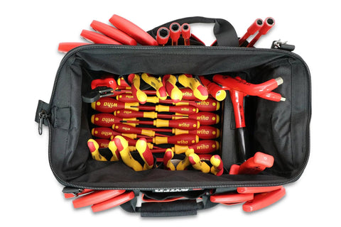 Insulated 66 Piece Tool Set With Pliers Cutters Nut Drivers Screwdrivers T Handles Knife Sockets Three Eighths Inch Drive Ratchet And Adjustable Wrench Pro Grade Electrician Kit in canvas bag.