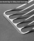 Slotted fish spatula blade in stainless steel with curved slots for flipping foods.