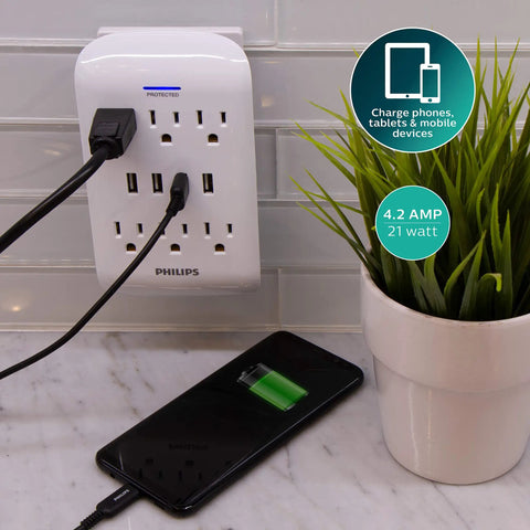 Six Outlet Surge Protector Power Strip with Four USB Ports Dual Pack Charging Station 900 Joules of Surge Protection in use