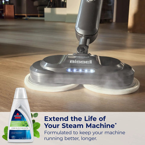 Bissell steam mop cleaning floor with Eucalyptus Mint Demineralized Steam Mop Water, 32 Oz, white, fresh scent cleaning solution.