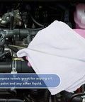 Gloved hand using Tough As Nails Cotton Shop Towels 12x14 Inches Pack Of 50 Plus 5 Bonus Reusable Cleaning Rags in auto engine bay