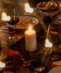 Candlelit dining table with warm ambiance, enhancing cozy vibe, Champagne Glow Silicone Light Bulbs 7.5 Watt Medium Base Individually Boxed Wholesale Pack Of 6 For A Cozy Vibe And Energy Efficient Warm White Lighting.