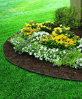 Heavy Duty No Dig Edging Kit For Garden Borders around flower bed, flexible black plastic, easy DIY no dig install, weather-resistant.