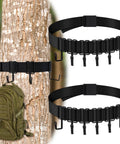 Two Pack Tree Stand Gear Hangers With Twelve Metal Hooks For Hunting Bow Arrows Bags Saddle Gear Hanger Set, showing two black straps with hooks on a tree.