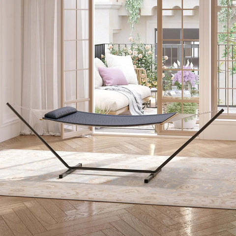 Double Hammock With Stand Heavy Duty 450Lbs Capacity Rugged Steel Frame Quilted Cushion And Storage Net For Backyard Chill Sessions Patio Camping Indoor Outdoor Use Dark Gray, displayed indoors with light streaming through windows.