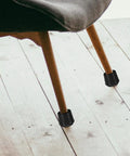 Non Slip Rubber Chair Leg Caps For Furniture And Table Legs Indoor Outdoor Floor Protectors on wood floor close-up