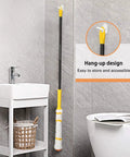 Self Wringing Twist Mop With Long 57 Inch Handle Microfiber Floor Mop With Top Scrub Pad hanging in bathroom