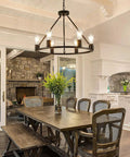 Industrial Black Wagon Wheel Chandelier With Six Candle Style Lights Dope Farmhouse Vibe Ceiling Fixture Over Dining Room Table