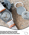 Three Pack Wire Loupe Holder Adjustable Magnifier Bracket For Watch Repair And Jewelry Making Durable Steel Eye Loupe Mount Secure Hands Free Magnification Accessory For Small Loupes shown with watch components.