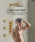 Man enjoying a shower under the EVERSTEIN 12" Rainfall Shower System with Handheld Spray, Brushed Gold.