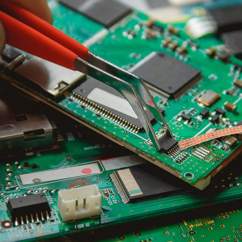 Using Six Piece Solder Wick Braided No Clean Desoldering Wicks Set on a PCB board for component removal