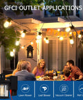 Family enjoying dinner outdoors with Motion Sensor Outdoor Porch Light With GFCI Outlet Built In Black Exterior Wall Lantern