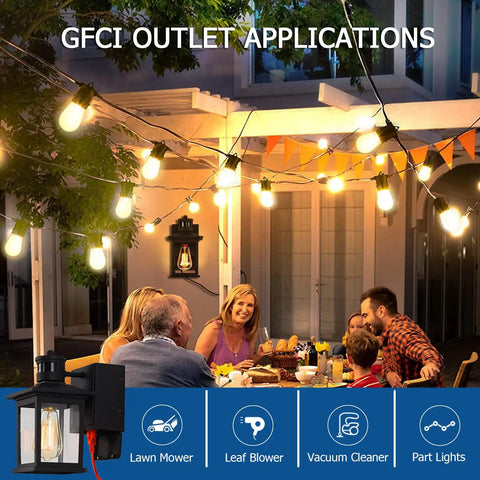 Family enjoying dinner outdoors with Motion Sensor Outdoor Porch Light With GFCI Outlet Built In Black Exterior Wall Lantern