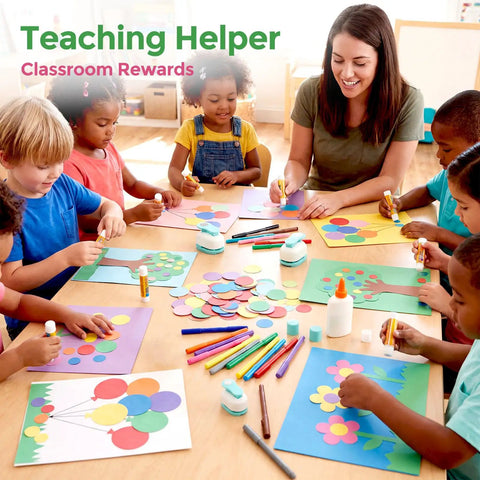 Teacher helping diverse group of children with colorful paper craft projects in classroom, supplies on table