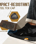 Close-up of black Men's Slip On Steel Toe Welding Work Boots with hook and loop closure, showing impact-resistant steel toe protection.