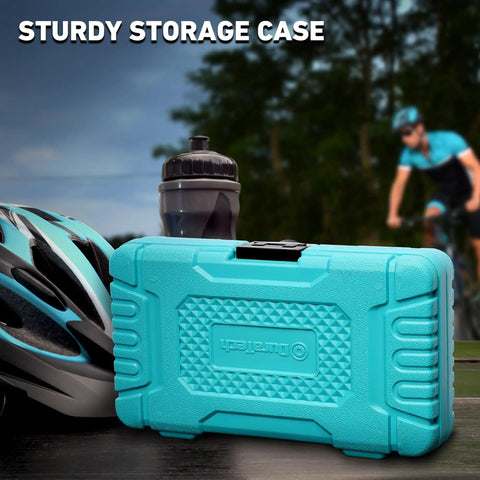 All In One 31 Piece Bicycle Repair Kit With Storage Box displayed beside helmet and bottle on a table outdoors