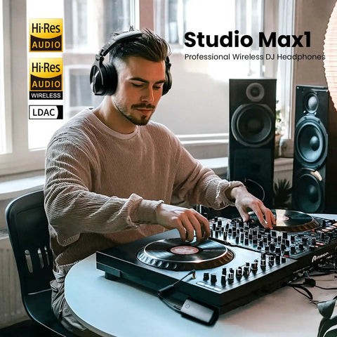 DJ using Ultra Low Latency Wireless DJ Headphones With 20ms Lag, 120 Hour Battery, Hi Res LDAC Audio, Dual Mic ENC, in studio.
