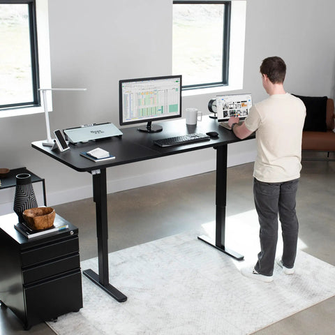 Vivo Black Height Adjustable Standing Desk 71x30 Inch Electric Sit Stand Workstation with monitor, keyboard, and ergonomic setup.