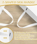 Close-up of T-shaped silk handle on a Three Pack Extra Large White Gift Bags With Handles 16 By 6 By 12 Inches Includes Six Tissue Papers For Birthday Wedding Holiday Shopping And Business Gift Wrap.
