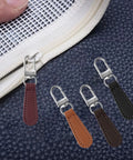 Dope 8 Piece Leather Zipper Pull Replacement Kit With Detachable Handles, Decorative Charms in assorted colors on a zipper